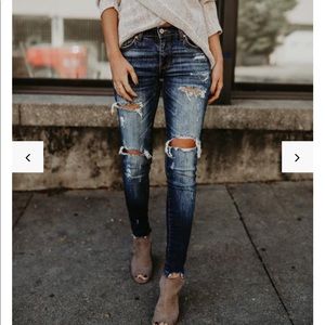 Distressed + dark-wash Kancan skinnies